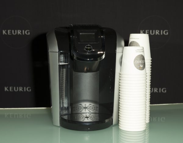 Picture of Keurig with Cups on a Table