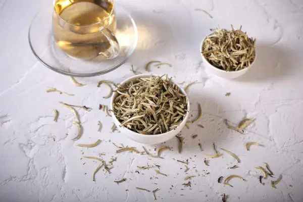 Picture of silver needle tea and tea leaves